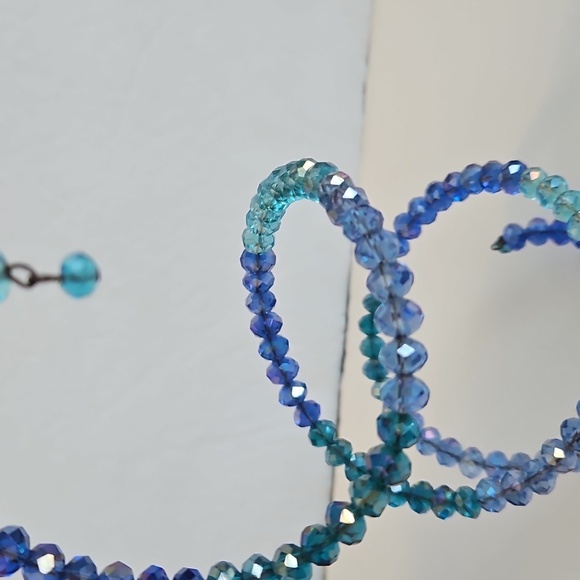 CRYSTAL AB LIGHT BLUE & MEDIUM BLUE Beads on Wire Bracelet. 2 1/2" Dia. - Picture 6 of 6